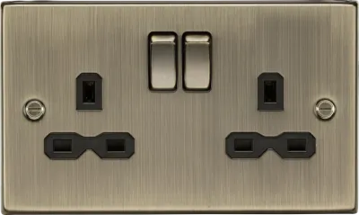 K/Bridge 13A 2G DP Switched Socket with Twin Earths - Antique Brass with Black Insert